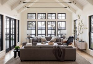 Interior design tips to increase property value in Sydney featuring a modern, open-plan living room by The DreamCatcher Interiors and Lifestyle.